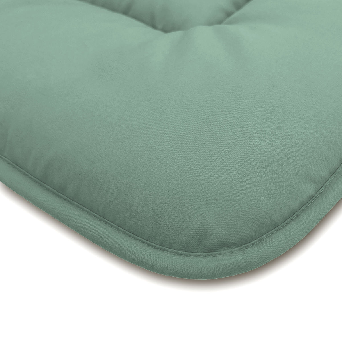 Close-up van het Zelesta Comfort Duo Dekbed in mintgroen & lichtgroen, met gewatteerd comfort en fijne stiksels - ideaal voor gebruik het hele jaar door en een perfecte match met klassieke dekbedden of een vaste overtrek.