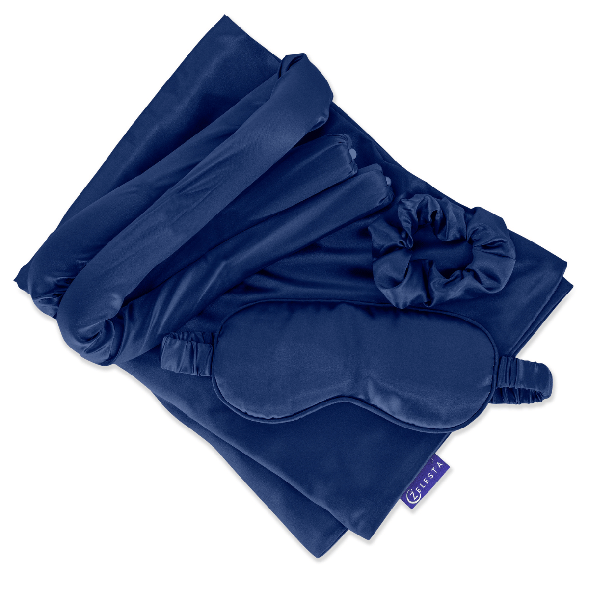 Ervaar de Zelesta Sleeping Beauty Set - Bliss Blue: een marineblauwe satijnen slaapset met moerbeizijde kussensloop, oogmasker, scrunchie en haarband - perfect voor een anti-aging schoonheidsslaapje.