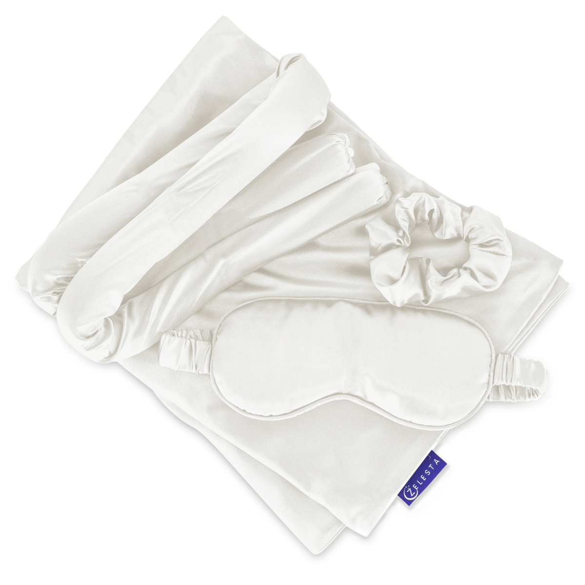 De Zelesta Sleeping Beauty Set - Pearl White bestaat uit een satijnen kussensloop, slaapmasker, scrunchie en een onderlaken, allemaal elegant weergegeven op een witte achtergrond.