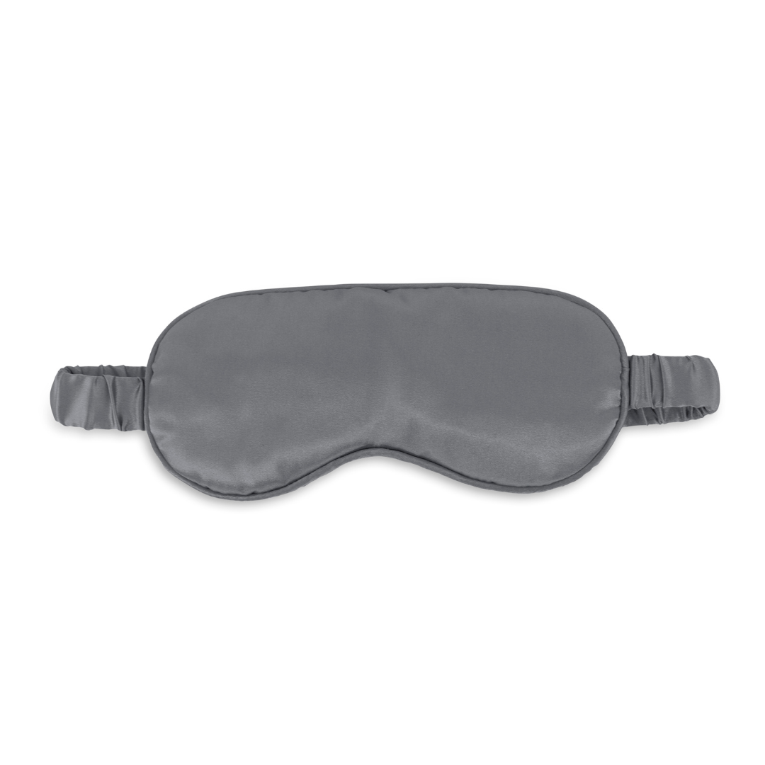De Zelesta Sleeping Beauty Set - Amazing Anthracite heeft een grijs zijden slaapmasker met een elastische band, afgebeeld op een witte achtergrond. Combineer het met de Mulberry zijden kussensloop voor rustgevende, anti-aging luxe.
