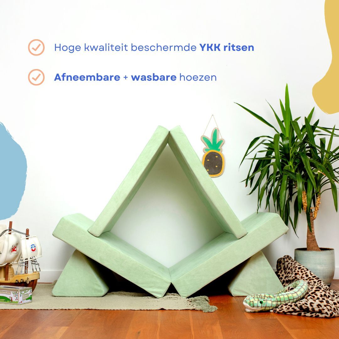 De BAAAP - De geliefde speelbank - Mint Breeze is opgevouwen in een tentvorm naast een potplant, mand en kinderspeelgoed; Nederlandse tekst benadrukt kenmerken zoals ruimtelijk inzicht.