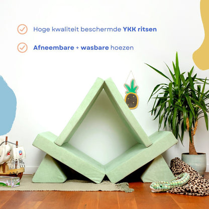 De BAAAP - De geliefde speelbank - Mint Breeze is opgevouwen in een tentvorm naast een potplant, mand en kinderspeelgoed; Nederlandse tekst benadrukt kenmerken zoals ruimtelijk inzicht.