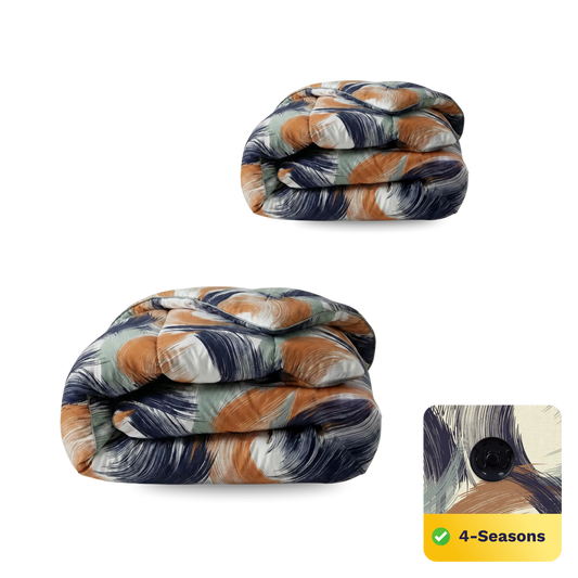 Twee gevouwen dekbedden met een abstract penseelstreekpatroon in blauw, oranje en beige. Het Zelesta Wonderbed 4 Seasons Double - Urban Brush is temperatuurregulerend en ontworpen voor comfort het hele jaar door.