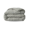 Een deken op elkaar gevouwen, net als het Zelesta Wonderbed Katoen - Morning Grey voor extra comfort.