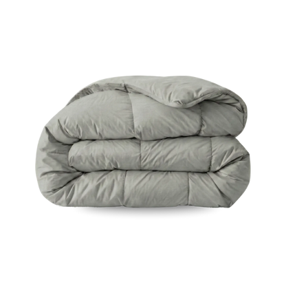 Een deken op elkaar gevouwen, net als het Zelesta Wonderbed Katoen - Morning Grey voor extra comfort.