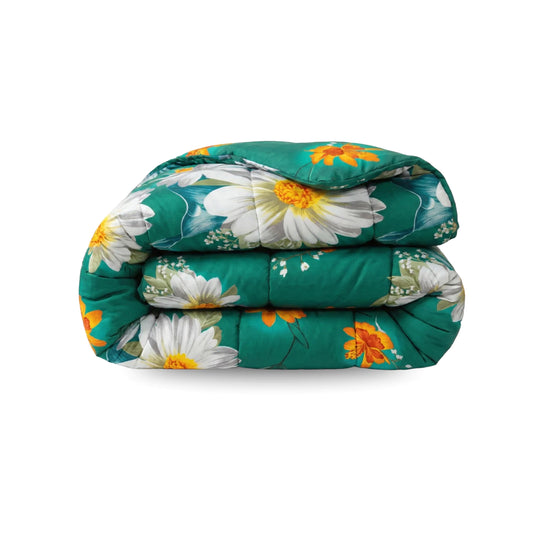 Een gevouwen groen Zelesta Wonderbed - Spring Flowers dekbed met grote witte en gele bloemen, oranje accenten; dit wasbaar dekbed is ook anti-allergisch.