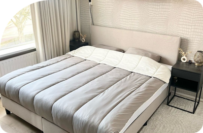 Opgemaakt bed met Zelesta dekbed